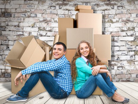 Local man and van team handling boxes and furniture in Whitechapel