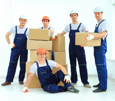 Packed boxes and furniture ready for a local Whitechapel home move