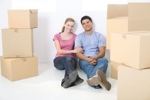 Organised packing for a Whitechapel flat move with labelled boxes and household items