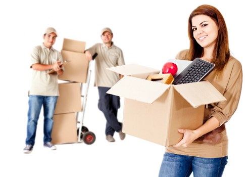 Organised office boxes and furniture prepared for relocation