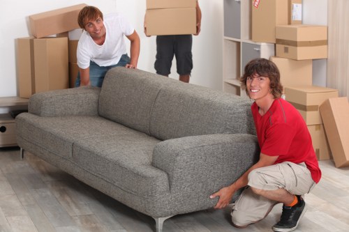 Unloading furniture into a new flat in Whitechapel