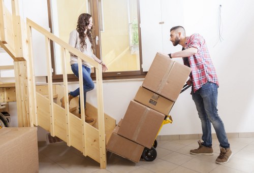 Loading furniture into a removal van in Whitechapel