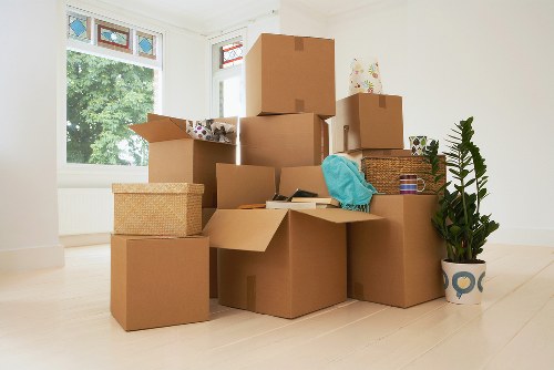 Professional movers loading a van in East London