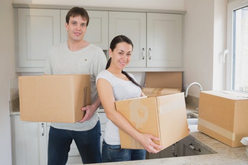 Professional movers handling furniture during a Whitechapel relocation